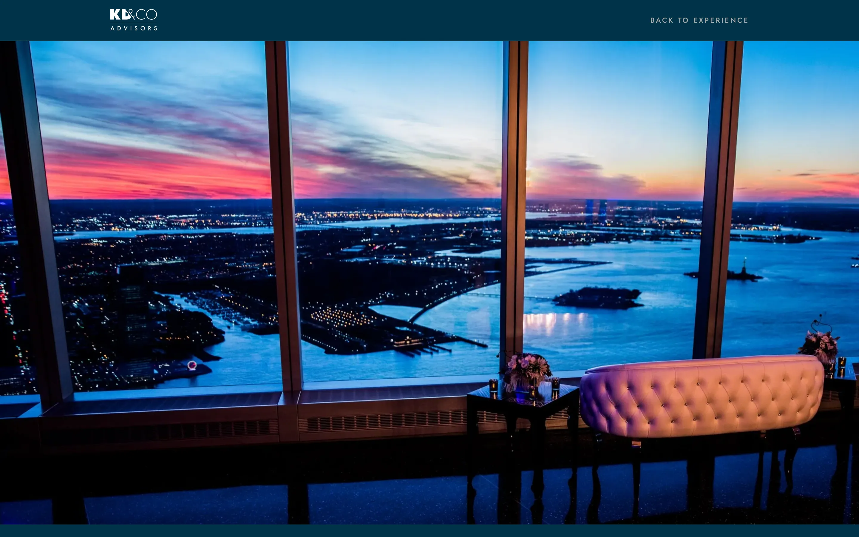 A KD&CO engagement page opening on a full-width view from One World Observatory at dusk.